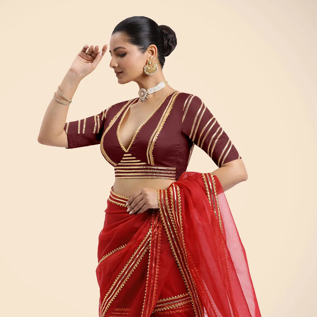 Navya x Tyohaar | Burgundy Elbow Sleeves FlexiFit™ Saree Blouse with Plunging V Neckline with Tasteful Golden Gota Lace