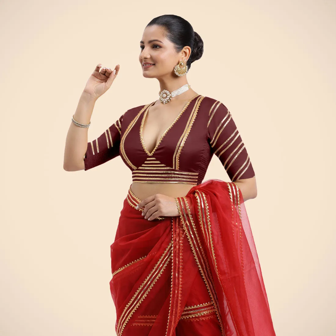 Navya x Tyohaar | Burgundy Elbow Sleeves FlexiFit™ Saree Blouse with Plunging V Neckline with Tasteful Golden Gota Lace