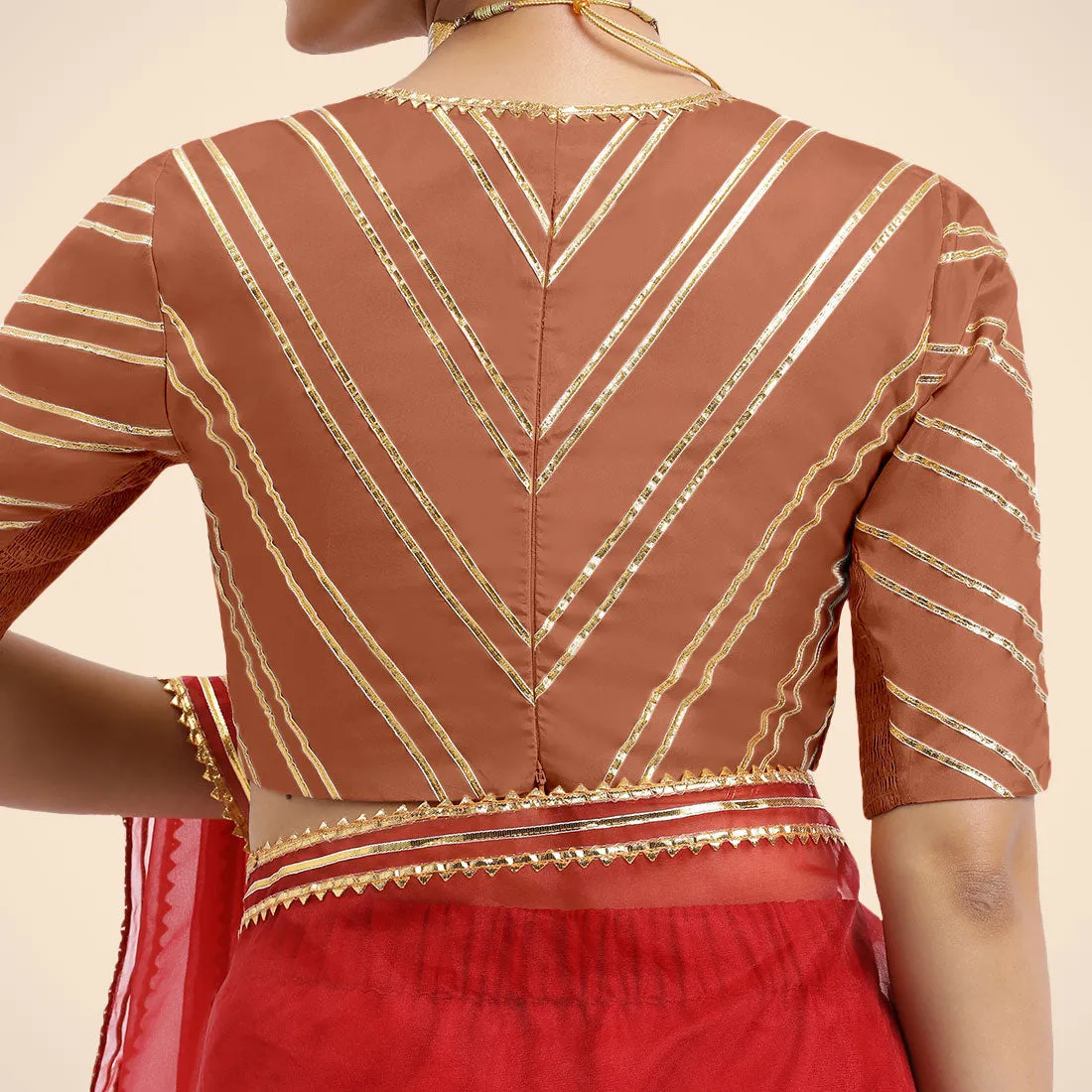 Navya x Tyohaar | Metallic Copper Elbow Sleeves FlexiFit™ Saree Blouse with Plunging V Neckline with Tasteful Golden Gota Lace