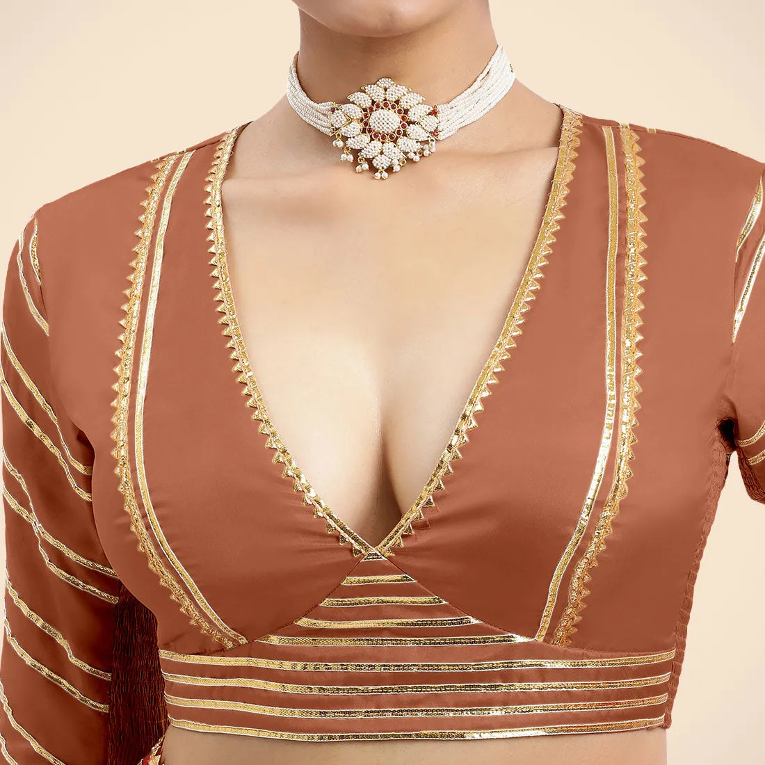 Navya x Tyohaar | Metallic Copper Elbow Sleeves FlexiFit™ Saree Blouse with Plunging V Neckline with Tasteful Golden Gota Lace